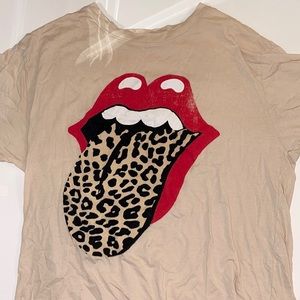 Tan Rolling stones t-shirt.